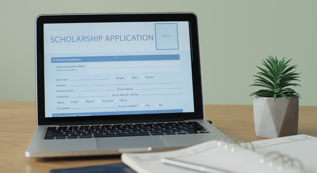 laptop showing online scholarship form